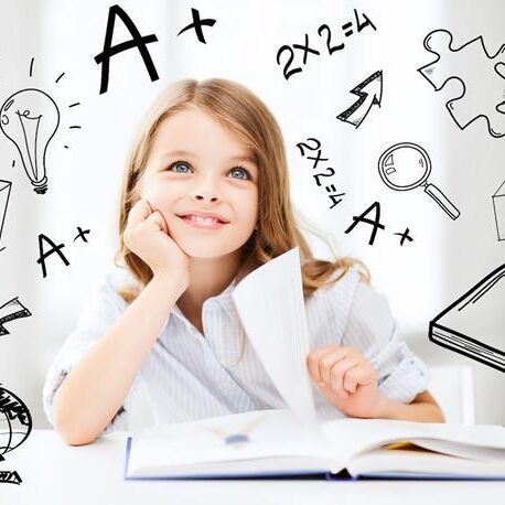 education and school concept – little student girl studying at school