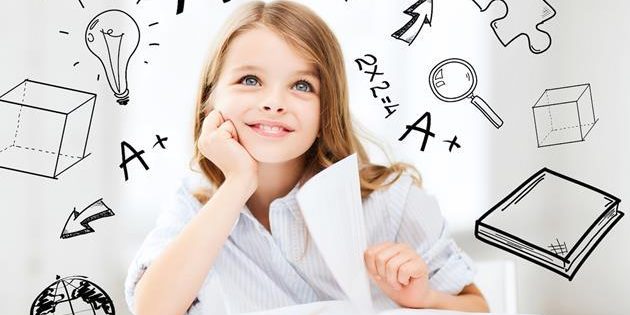 education and school concept – little student girl studying at school