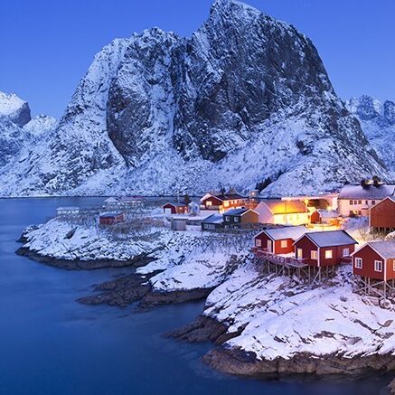 Norwegian fisherman’s cabins on the Lofoten at dawn in winter
