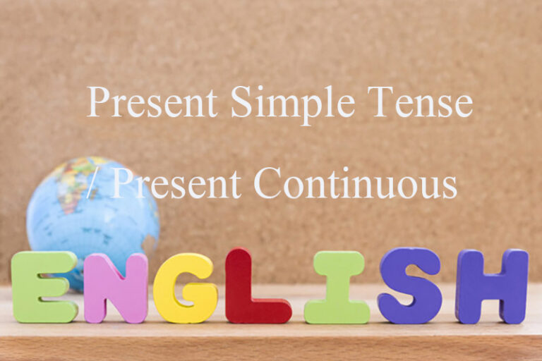 word english with globe over wooden background