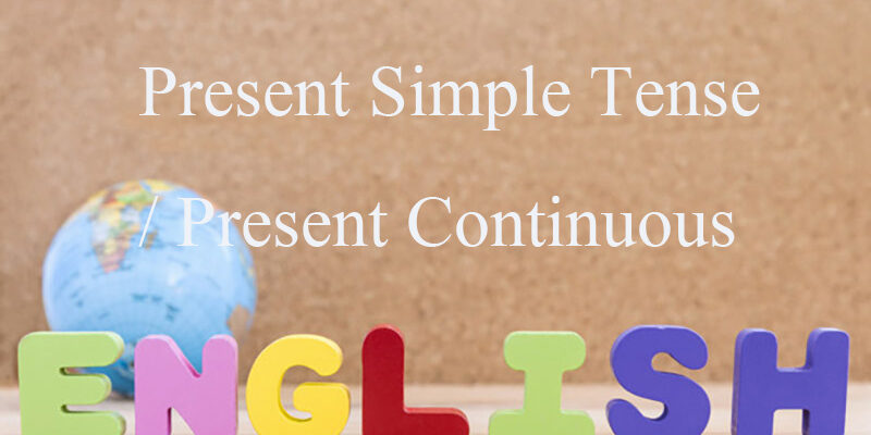 word english with globe over wooden background